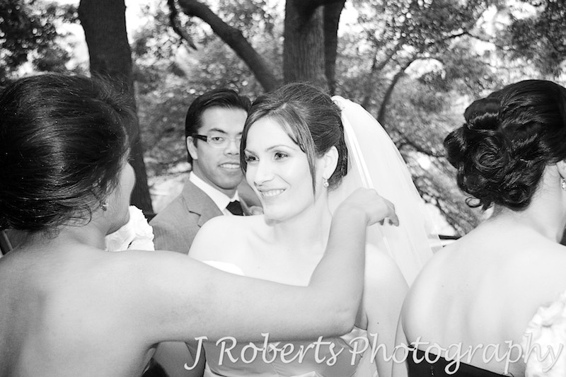 Bride being congratulated after wedding ceremony - wedding photography sydney
